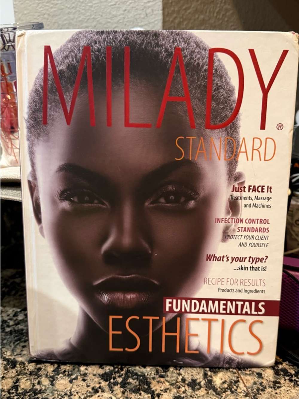 MILADY®️ STANDARD FUNDAMENTAL ESTHETICS HARD COVER BOOK | USED COPY